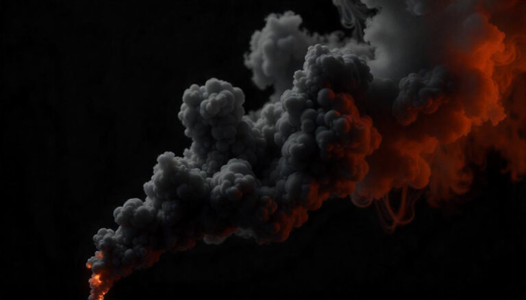 Rising gray smoke with orange embers against dark background caused by incomplete combustion